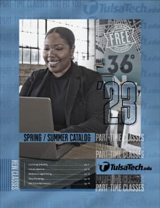 Catalog cover depicting a woman working on her laptop
