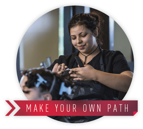Make Your Own Path; a Tulsa Tech Cosmetology student practices cutting hair