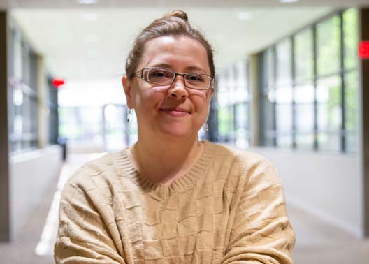 Student Jessica Hutton stands in the hallway of Broken Arrow Campus